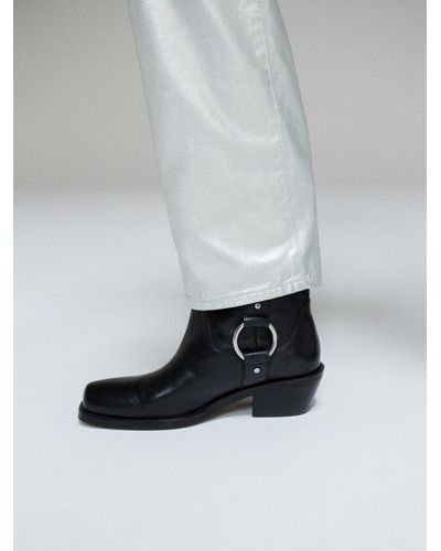 Sisley Ankle Boots With Metal Ring - White