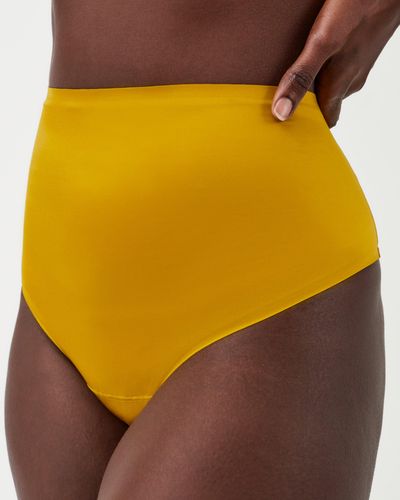 Spanx Satin Smoothing Brief in Yellow