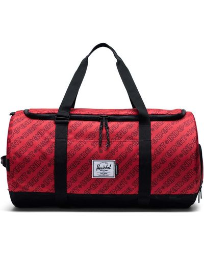 Herschel Supply Co. Sac de voyage Sutton Carryall Independent Unified Red/Black Camo - Rouge