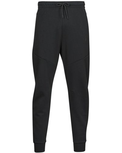Pantalons de Survêtement Homme  Nike Jogging Polaire Foundation à