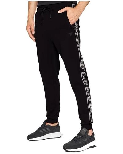 Pantalons de survêtement Guess pour homme | Réductions Black Friday jusqu'à  50 % | Lyst