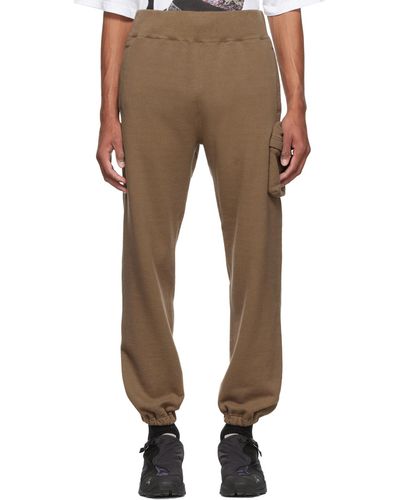 Undercover Pantalon de survêtement brun en coton édition eastpak - Marron