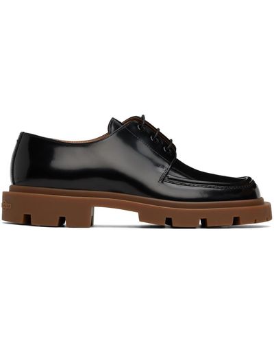 Maison Margiela Derbys noirs à semelle à reliefs