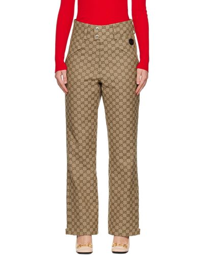 Gucci Pantalon brun à logos gg - Multicolore