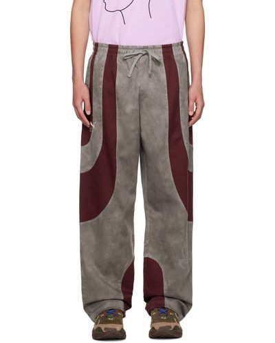 Kidsuper Pantalon de survêtement gris et bourgogne édition puma - Marron