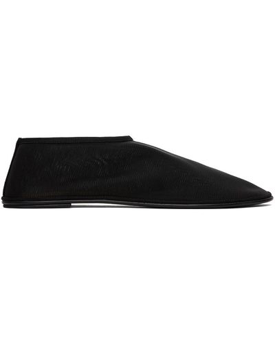 The Row Chaussons de style chaussette noirs