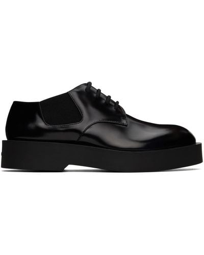 Jil Sander Derbys noirs en cuir poli