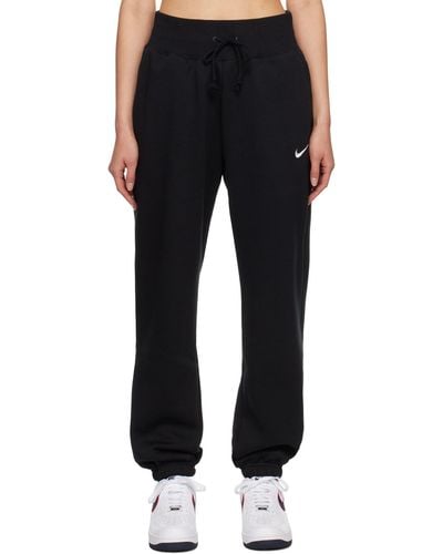 Nike Track pants and sweatpants for Women, Online Sale up to 48% off