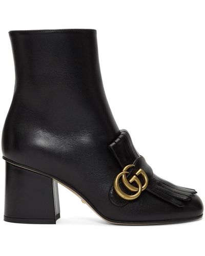 Gucci Bottines noires à ferrure à logo