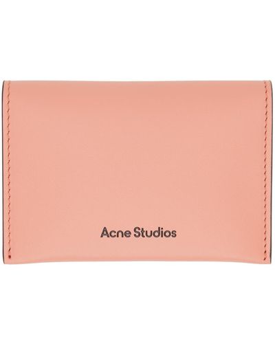 Acne Studios Porte-cartes rose en cuir à deux volets - Noir