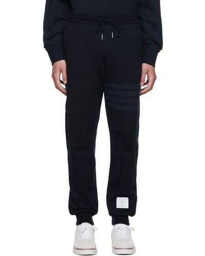 Thom Browne Thom e pantalon de survêtement bleu marine à quatre rayures