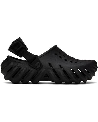 Crocs™ Sabots noirs à semelle echo