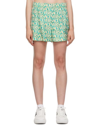 Versace Short vert à motif à logo