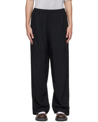 Acne Studios Relaxed-fit Zip Trousers - Black