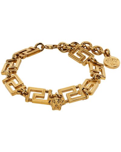 Versace Bracelet doré à motif à clé grecque - Métallisé