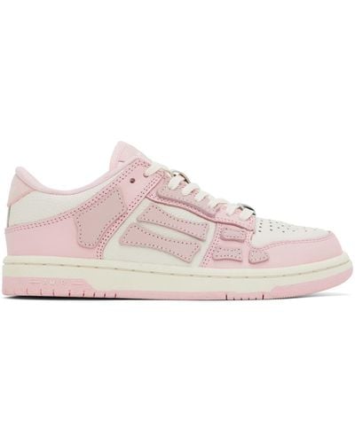 Amiri Baskets basses rose et blanc à appliqués skel top