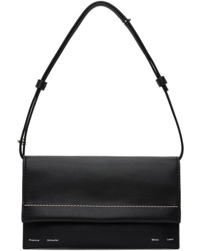 Proenza Schouler Petit sac noir à rabat et à panneaux accordéon - label