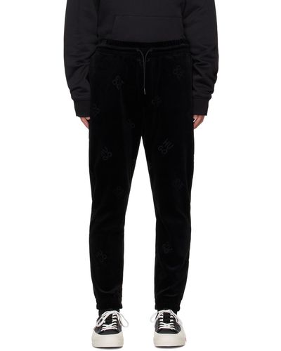 HUGO Pantalon de survêtement noir à motif à logo gaufré