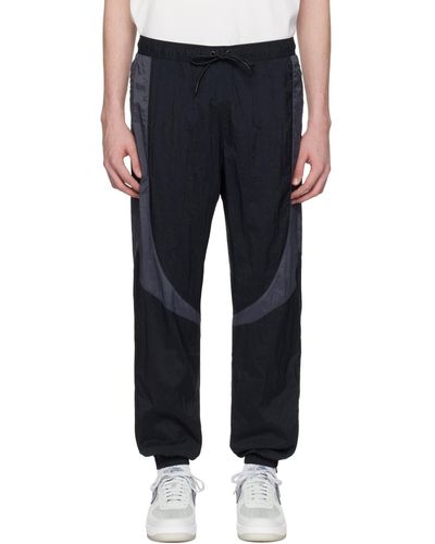 Nike Pantalon de survêtement sport jam noir et gris