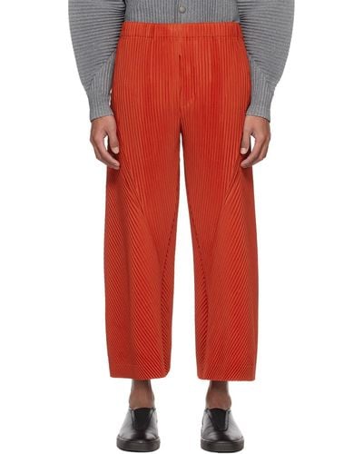 Homme Plissé Issey Miyake Homme Plissé Issey Miyake Orange Pleats Bottoms 2 Trousers - Red