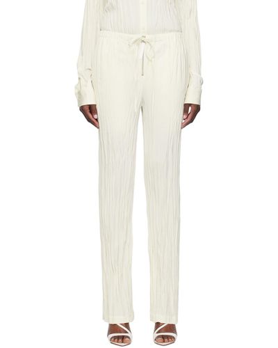 Helmut Lang Pantalon de détente blanc cassé en satin froissé - Neutre