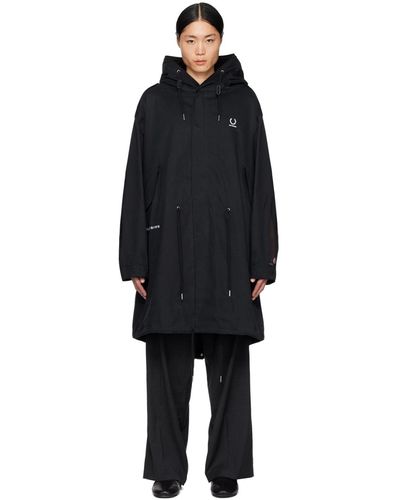 Raf Simons Manteau noir édition f perry