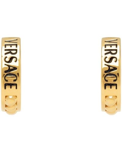 Versace Boucles d'oreilles à anneau dorées à logo - Noir