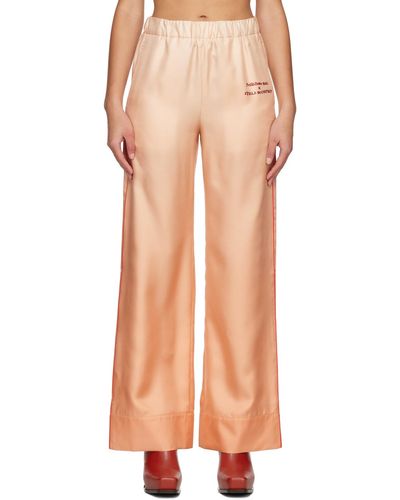 Stella McCartney Pantalon rose à logo imprimé - Orange