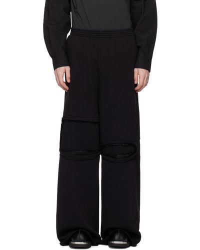 MM6 by Maison Martin Margiela Pantalon de survêtement à genoux à effet usé - Noir