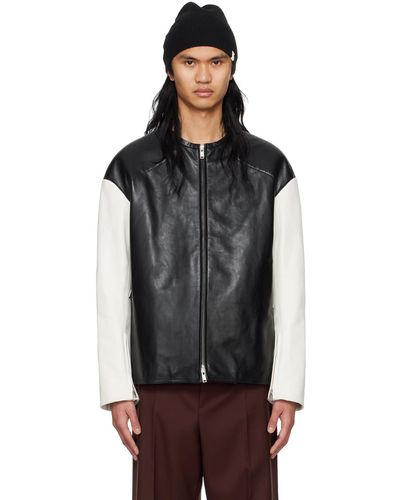 Jil Sander Blouson motard noir et blanc en cuir à glissière