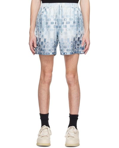 Amiri Short bleu à motif à logo dégradé