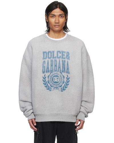 Dolce & Gabbana Pull molletonné gris à image à logo imprimée - Bleu