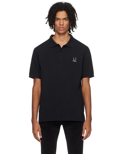 Raf Simons Polo noir édition f perry