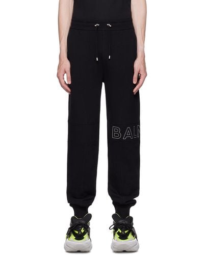 Balmain Pantalon de survêtement noir à logo gaufré