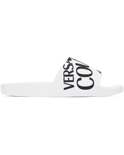 Versace Jeans Couture Sandales à enfiler blanches à logo gaufré