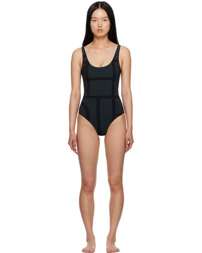 Totême Maillot de bain une pièce noir à monogrammes