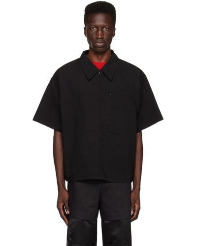 Spencer Badu Chemise noire à poches à glissière