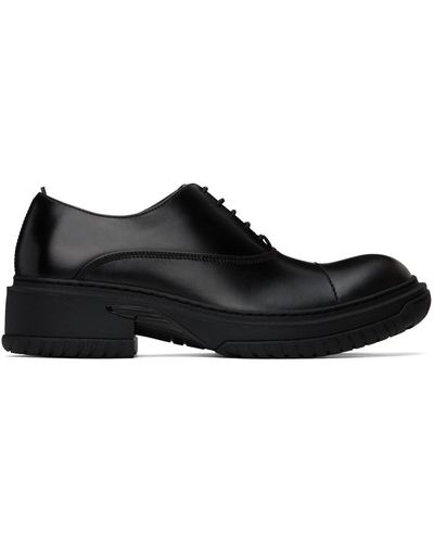 Lanvin Chaussures oxford medley noires en cuir