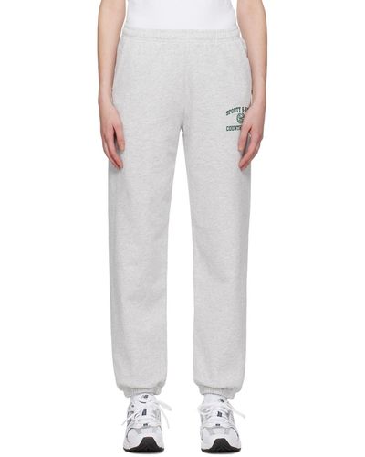 Sporty & Rich Sportyrich pantalon de détente de style collégial gris à armoiries - Blanc