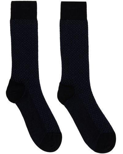 Ferragamo Chaussettes hauteur mollet noir et bleu marine à motif gancini