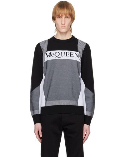 Alexander McQueen Pull noir et blanc à motif et logo en tricot jacquard