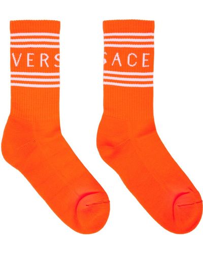 Versace Chaussettes à logo rétro '90s - Orange