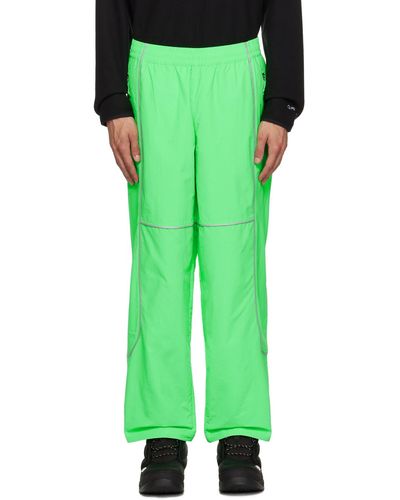 The North Face Pantalon tek vert à passepoils