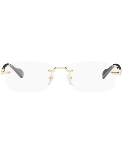 Gucci Lunettes rectangulaires percées doré et noir