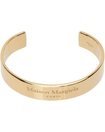 Maison Margiela Bracelet manchette doré à logo gravé - Noir