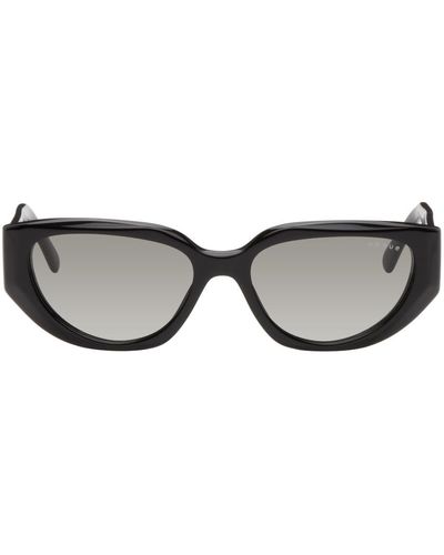 Vogue Eyewear Lunettes de soleil œil-de-chat noires édition hailey bieber