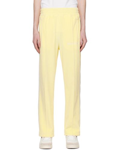 Palm Angels Pantalon de survêtement jaune à coutures pincées