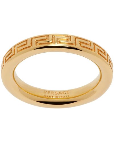 Versace Bague dorée à motif à clé grecque gravé - Métallisé