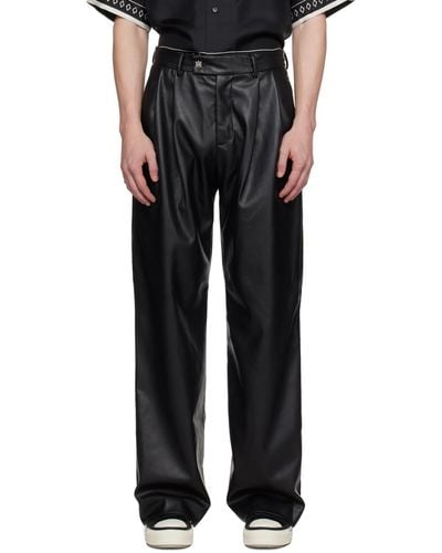 Amiri Pantalon noir en cuir synthétique à plis