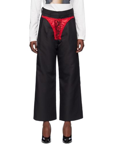 VAQUERA Pantalon noir et rouge à empiècement de style culotte